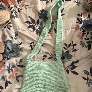 Hand made with zipper and very spacious bag that is machine washable